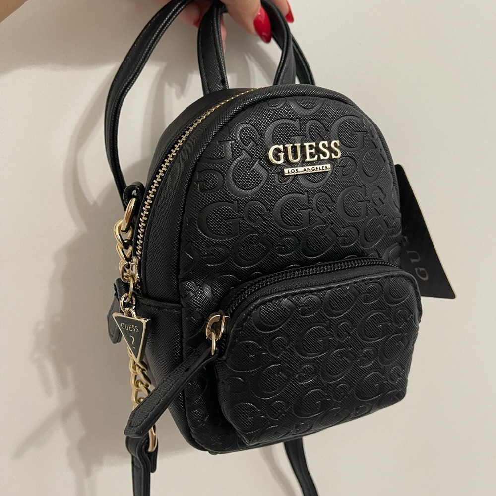 BRAND NEW GUESS BACKPACK.